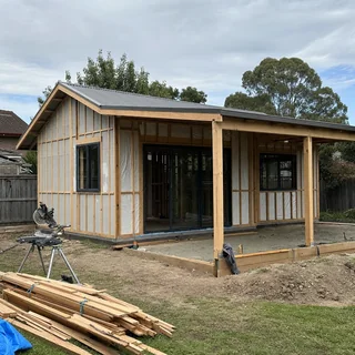 Completed granny flat in the rear yard of a suburban property