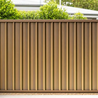 Vertical timber slat privacy fence in a front garden